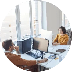 Professionals collaborating on business consulting services and digital transformation projects in a modern office